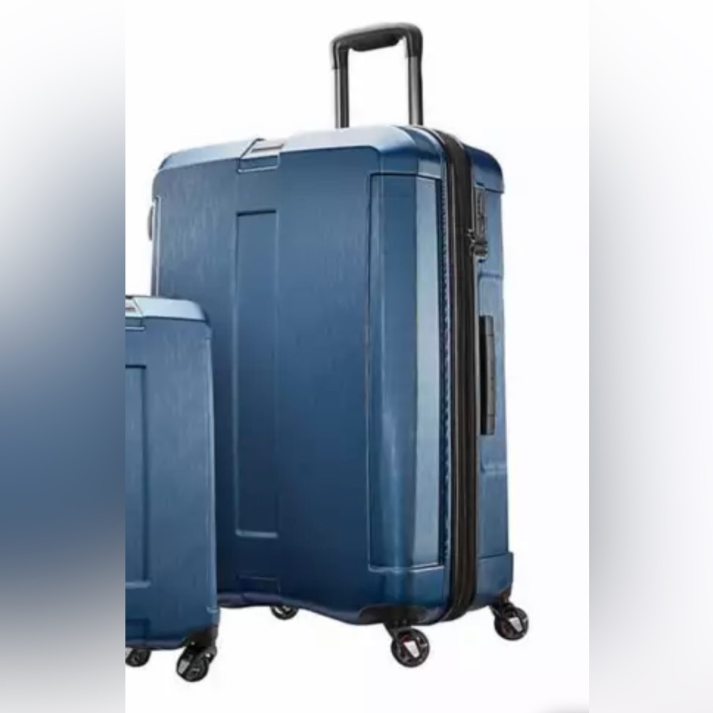 Brand NEW in Amazon box. Beautiful suitcase lightweight with wheels.